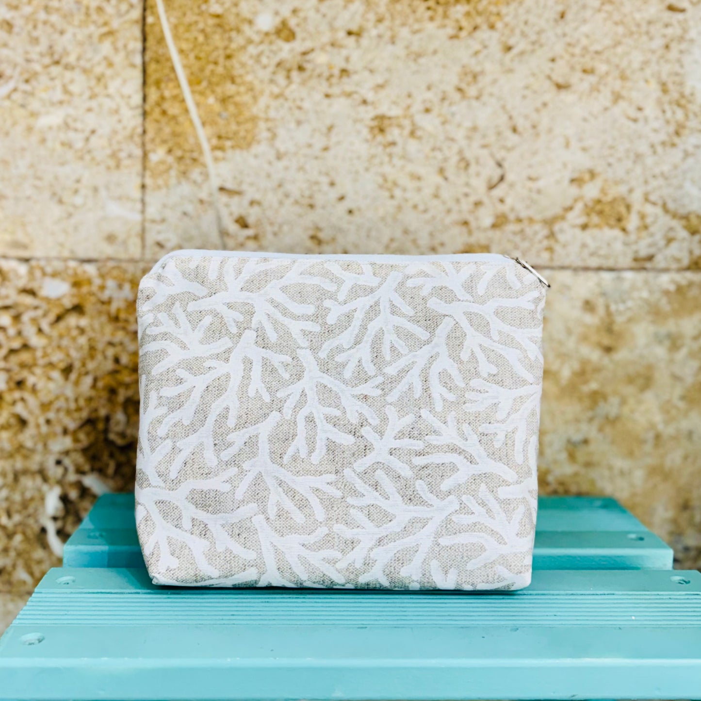 Neceser estampador coral.