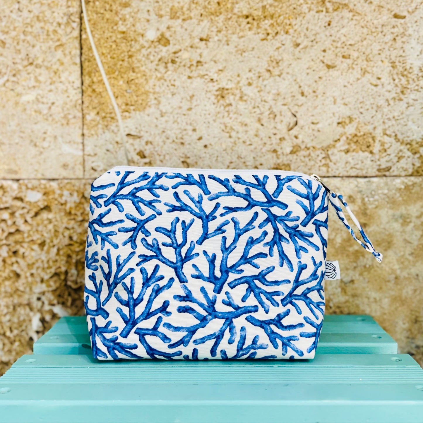Neceser estampador coral.